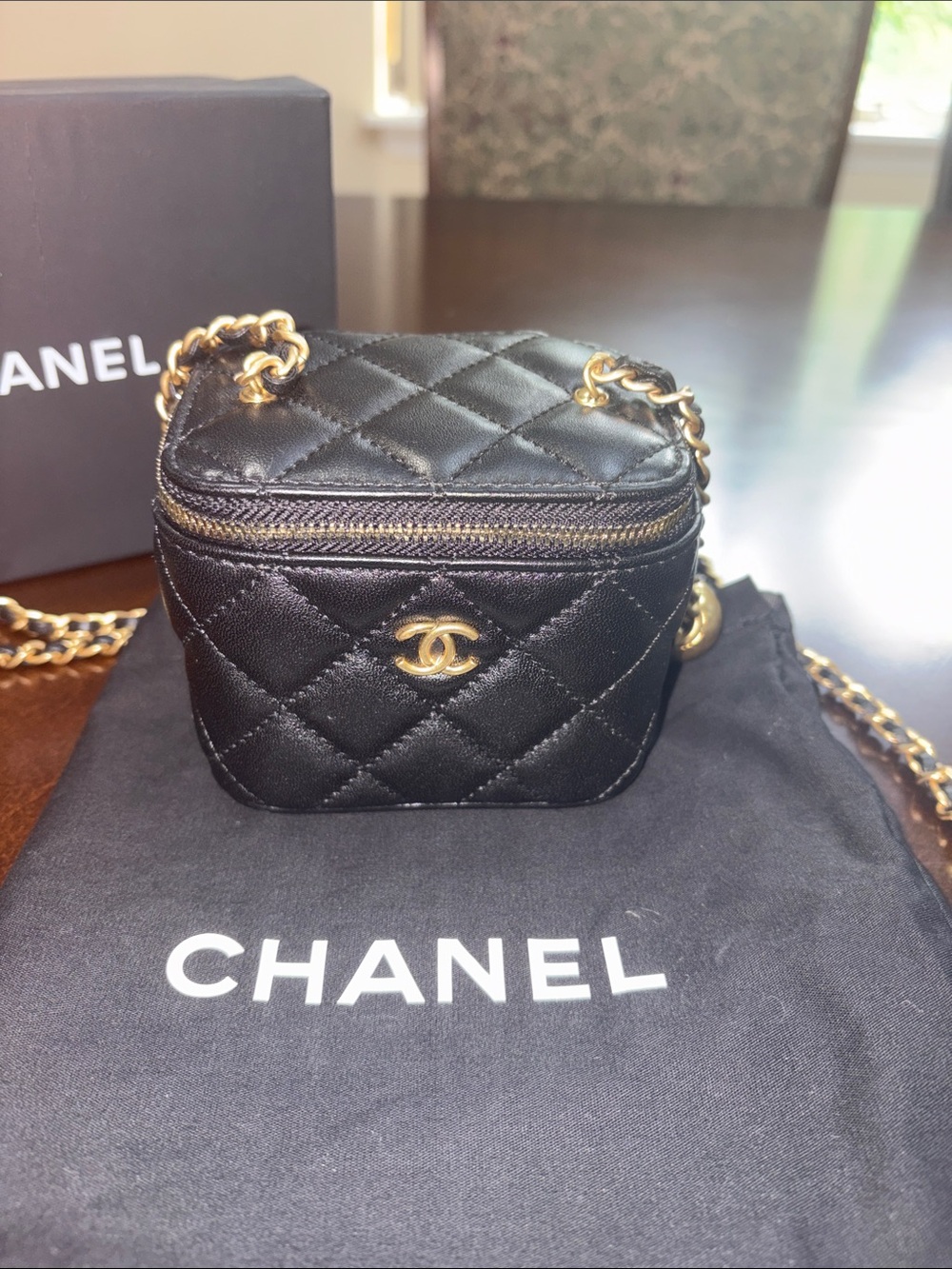 BRAND NEW! Chanel CC Bubble Vanity Case with Chain Mini Bag with dust bag.